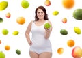 Happy plus size woman in underwear with apple Royalty Free Stock Photo