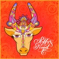 happy pongal handwritten ink lettering inscription on floral paisley pattern with cow
