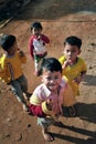 Happy poor child in tropical asia village