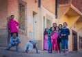 Happy poor friendly children girl and boy in Morocco village with old house Royalty Free Stock Photo