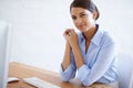 Happy, portrait and professional woman at desk in office with computer as clerk or happy secretary in administration Royalty Free Stock Photo