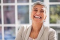 Happy, portrait and senior business woman in her modern corporate office in the urban city. Happiness, smile and Royalty Free Stock Photo