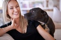 Happy, portrait or woman and dog on a sofa with love, are and bonding at home together. Pets, face and female person Royalty Free Stock Photo