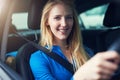 Happy, portrait and woman driving car for travel, journey and transportation. Face, smile and female person in vehicle Royalty Free Stock Photo