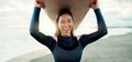 Happy, portrait and woman with surfing board at beach, sea and ocean on summer holiday, travel adventure and fun Royalty Free Stock Photo