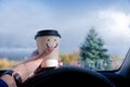 Happy and Positive Mind Concept. Driver holding a Coffee Mug with Smiling Face Cartoon