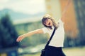 Happy pre-teen young girl. Cute little girl in the city on a sunny day. Portrait young girl. Toned image Royalty Free Stock Photo