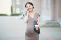 Happy pregnant business woman on phone Royalty Free Stock Photo