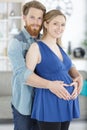 happy pregnant couple hugging Royalty Free Stock Photo