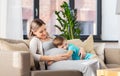 Happy pregnant mother and son hugging at home Royalty Free Stock Photo