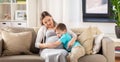 Happy pregnant mother and son hugging at home Royalty Free Stock Photo