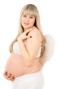 Happy pregnant woman with angel wings Royalty Free Stock Photo