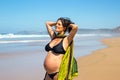 Happy pregnant woman at the atlantic ocean Royalty Free Stock Photo