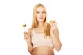 Happy pregnant woman with cake and pickles Royalty Free Stock Photo