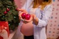 Happy Pregnant Woman Decorating Christmas Tree Enjoying Magic Holiday Atmosphere