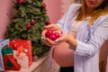 Happy Pregnant Woman Decorating Christmas Tree Enjoying Magic Holiday Atmosphere