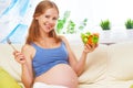 Happy pregnant woman eats healthy food vegetable salad Royalty Free Stock Photo