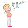 Happy pregnant woman hanging clothes for her unborn baby boy