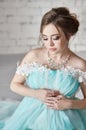 Happy Pregnant woman in long evening dress touching belly hands. Waiting the birth of a child, a woman in her eighth month Royalty Free Stock Photo