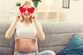 Happy pregnant woman resting on sofa Royalty Free Stock Photo