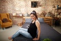 Happy pregnant woman sitting on bed at home Royalty Free Stock Photo