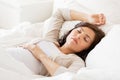 Happy pregnant woman sleeping in bed at home Royalty Free Stock Photo