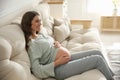 Happy pregnant woman touching her belly Royalty Free Stock Photo