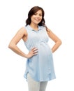 Happy pregnant woman touching her big belly Royalty Free Stock Photo