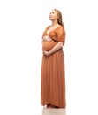 Happy pregnant woman touching her big belly Royalty Free Stock Photo