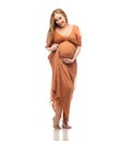 Happy pregnant woman touching her big belly Royalty Free Stock Photo