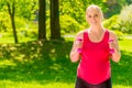 Happy pregnant woman watching her figure doing exercises Royalty Free Stock Photo