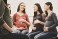 Happy pregnant women are talking together at antenatal class at the hospital Royalty Free Stock Photo