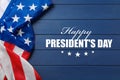 Happy President`s Day - federal holiday. American flag and text on blue wooden background, top view Royalty Free Stock Photo