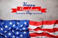 Happy President`s Day - federal holiday. American flag and text on grey stone background, top view Royalty Free Stock Photo