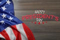 Happy President`s Day - federal holiday. American flag and text on wooden background, top view Royalty Free Stock Photo