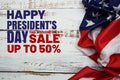 Happy President`s Day message with American flag on wooden background Royalty Free Stock Photo