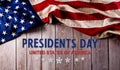 Happy presidents day concept with flag of the United States and the text on dark  wooden background Royalty Free Stock Photo