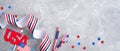 Happy Presidents day sale banner mockup. American flag, sign USA, grosgrain ribbon, confetti stars, drinking straws on stone. USA Royalty Free Stock Photo