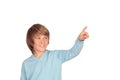 Happy preteen boy pointing something