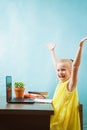 Happy preteen child in delight learn lessons at home on quarantine Royalty Free Stock Photo