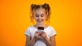 Happy preteen girl holding plate of delicious chocolate enjoying taste, emotions