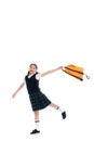 Happy preteen schoolkid in skirt holding