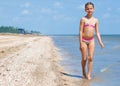 Happy Pretty beautiful girl running on beach Royalty Free Stock Photo