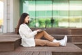 Happy pretty calm millennial european lady enjoy work, typing by laptop