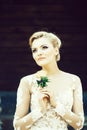 Happy pretty cute bride with beautiful makeup in wedding dress Royalty Free Stock Photo