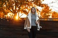 Happy pretty joyful young woman in a stylish gray sweater