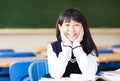 Happy pretty student girl with books in classroom Royalty Free Stock Photo