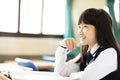 Happy pretty student girl with books in classroom Royalty Free Stock Photo