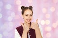 Happy pretty teenage girl showing thumbs up Royalty Free Stock Photo