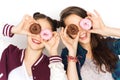 Happy pretty teenage girls with donuts having fun Royalty Free Stock Photo